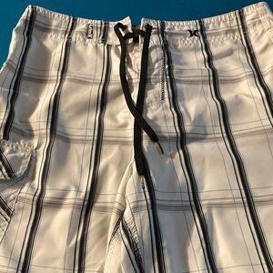 BOARD SHORTS. Easy wear and care. Excellent condition, lightweight
